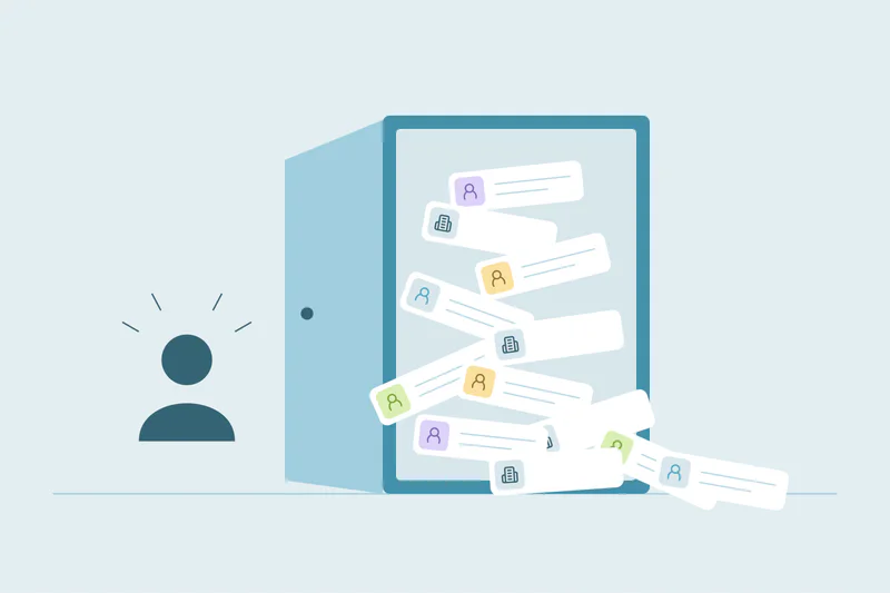 An administrator facing a cabinet overflowing with contact cards