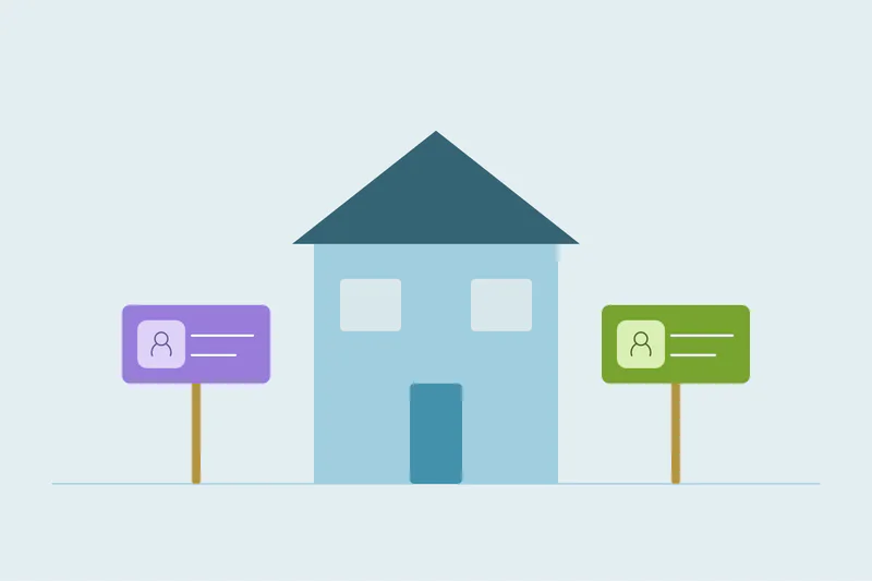 A house with two separate customer contact cards outside