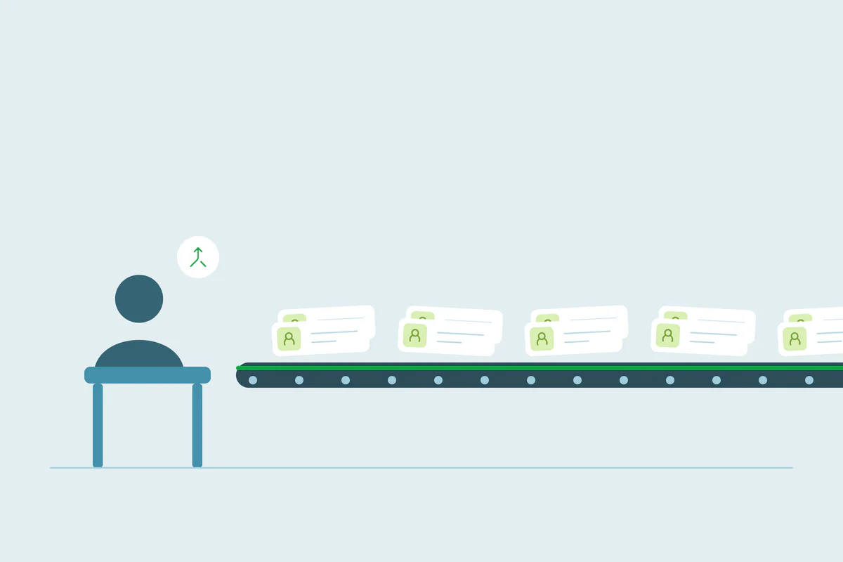 An administrator beside a conveyor belt of contact records